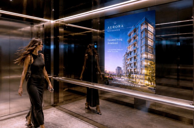 Elevator advertisement mirror